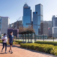 The AIA Central building in Hong Kong on March 9. Hong Kong is the world’s most expensive city to live in as an expat for the second year in a row, according to a new study. | BLOOMBERG