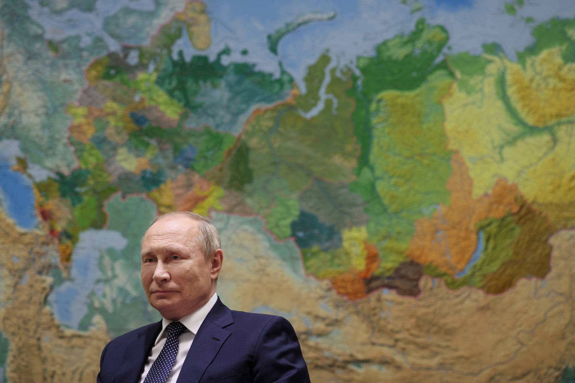 Russian President Vladimir Putin gives an interview to Rossiya-1 TV channel in Sochi, Russia on Friday. | Sputnik / Mikhail Klimentyev / Kremlin via REUTERS 