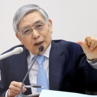 Bank of Japan Gov. Haruhiko Kuroda during a news conference at the central bank\'s headquarters in Tokyo in April | POOL / VIA BLOOMBERG