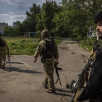Members of the Ukrainian regional police patrol in the city of Lysychansk | IVOR PRICKETT / THE NEW YORK TIMES
