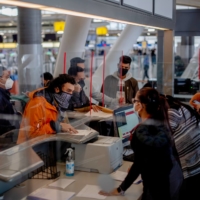 An airline counter at John F. Kennedy International Airport in New York in January | HILARY SWIFT / THE NEW YORK TIMES