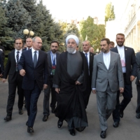 Russian President Vladimir Putin and his then Iranian counterpart, Hassan Rouhani, meet in Yerevan, Armenia, in October 2019.  | SPUTNIK / KREMLIN / VIA REUTERS