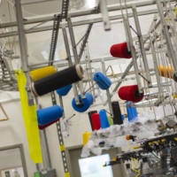Spools of lycra fiber at an Invista research center in Newark, Delaware, in 2014. | JESSICA KOURKOUNIS / THE NEW YORK TIMES