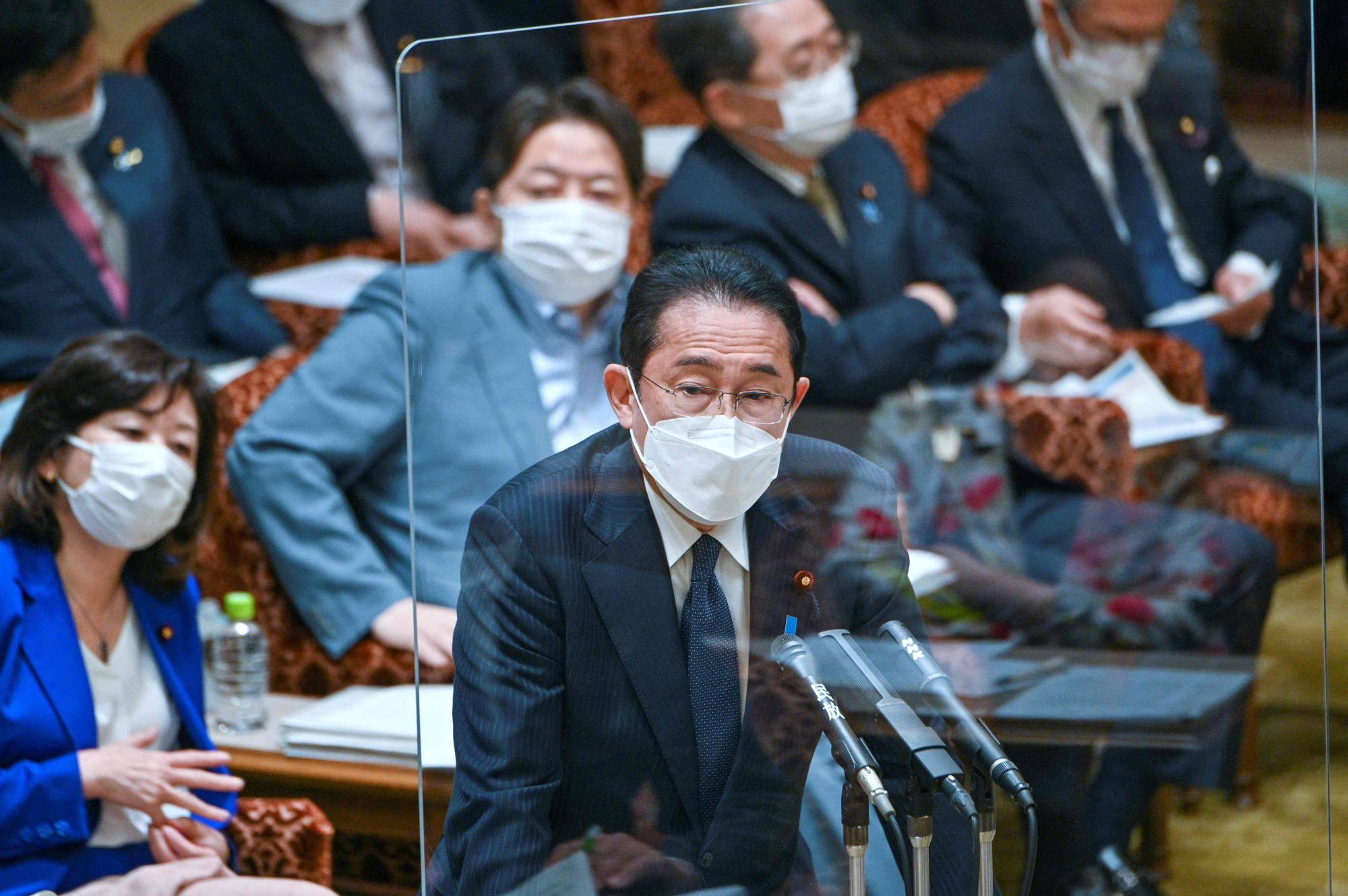 Prime Minister Fumio Kishida answers questions during a parliamentary session at the Upper House in Tokyo on Monday.  | AFP-JIJI