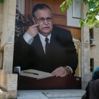 A portrait of late former Iraqi President Jalal Talabani on a wall in Sulaymaniyah, Iraq, on Thursday. The Patriotic Union of Kurdistan party, led by the Talabani clan, have stalled their political rivals\' efforts to create an oil pipeline to Europe.  | REUTERS