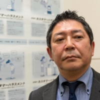 Takanori Namigishi has been leading efforts to eradicate what has become a social phenomenon known as <em>“kasuhara,”</em> (a portmanteau of the English words “customer harassment”), where malicious claims and unreasonable demands by customers are leveled at sales representatives and employees. | ROB GILHOOLY
