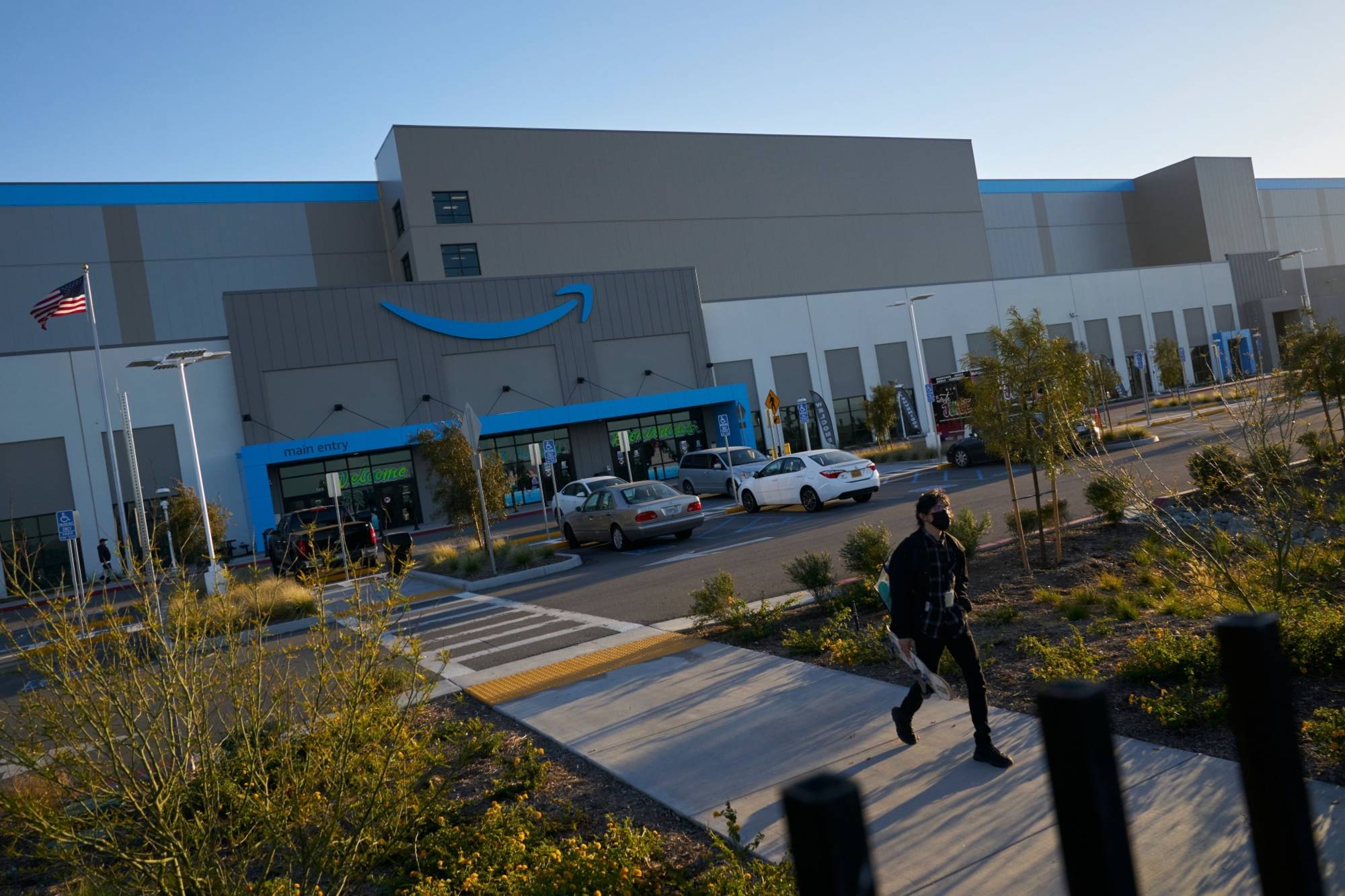 An employee leaving Amazon's San Diego facility | Bloomberg