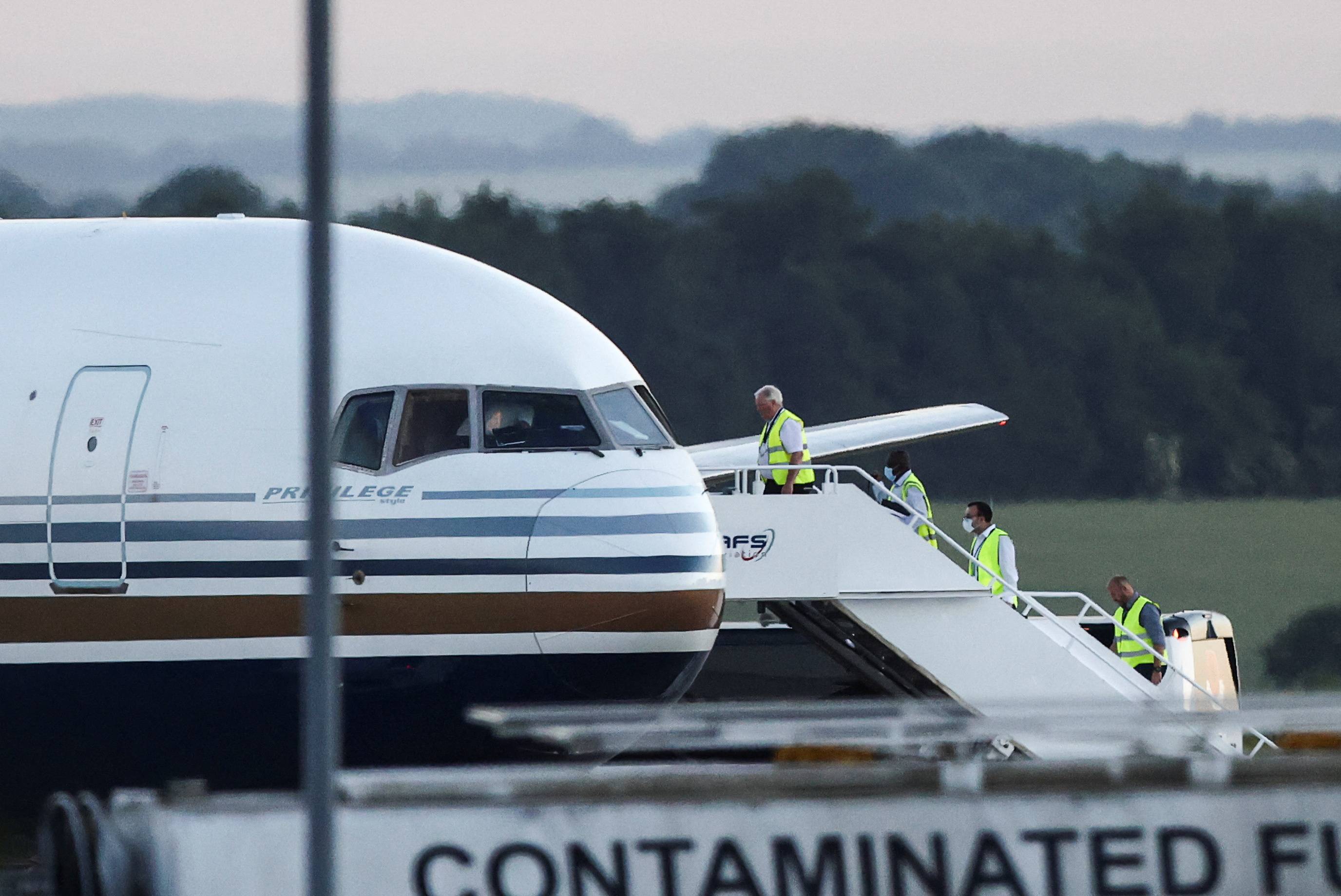 A plane that had been set to be first to transport migrants to Rwanda at MOD Boscombe Down base in Wiltshire, Britain, on Tuesday | REUTERS 