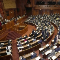 A bill to establish the children and families agency is passed at the Upper House plenary session Wednesday. | KYODO
