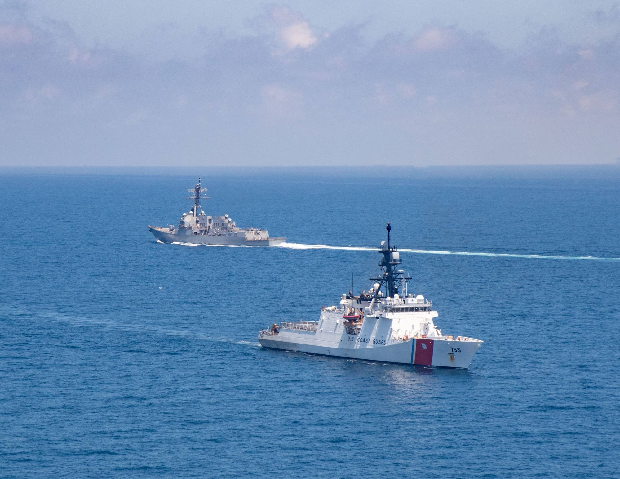 The Arleigh Burke-class guided-missile destroyer USS Kidd and U.S. Coast Guard cutter Munro conduct Taiwan Strait transits on Aug. 27. | U.S. NAVY / VIA REUTERS  