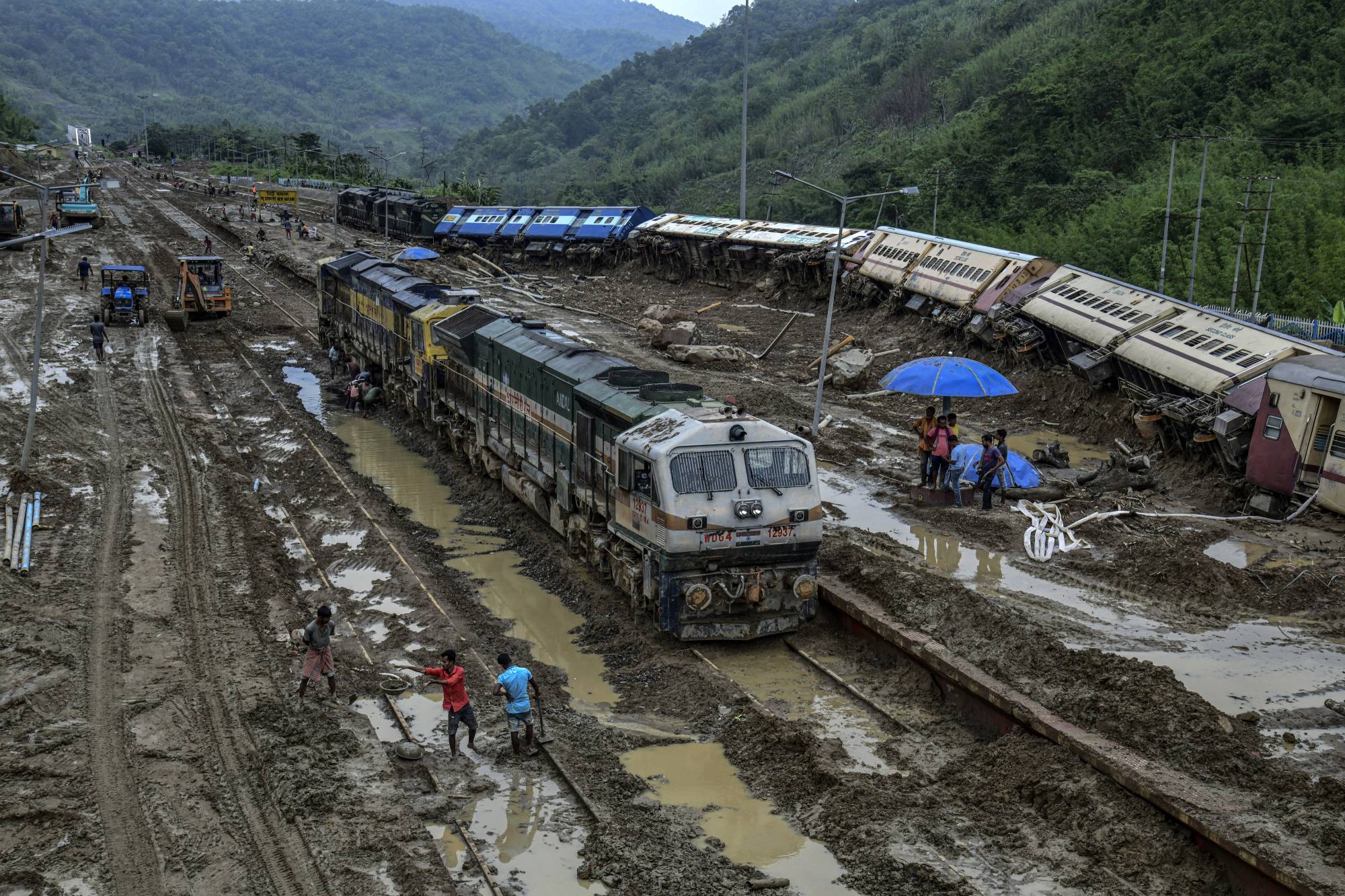 A train derailed by a landslide in Dima Hasao, India, on June 3. | Atul Loke / The New York Times