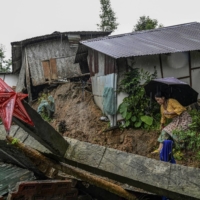 Houses damaged by a landslide in Dima Hasao, India, on June 3. | ATUL LOKE / THE NEW YORK TIMES