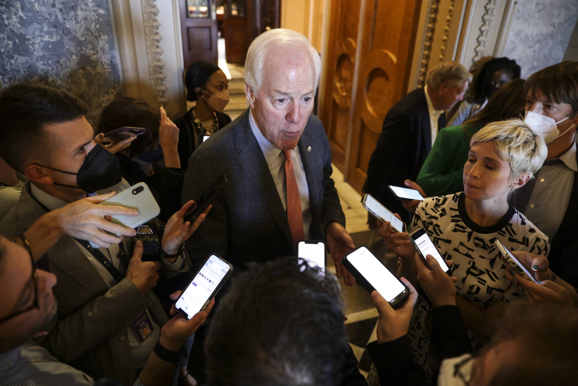 Sen. John Cornyn of Texas talks to reporters on Capitol Hill in Washington on June 6. The involvement of the conservative Cornyn in senate bipartisan talks means that resulting gun legislation proposals, if any, are likely to include only incremental steps. | (Oliver Contreras/The New York Times
