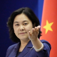 Chinese Foreign Ministry spokeswoman Hua Chunying speaks at a news conference in Beijing in August 2021.  | KYODO