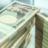 Half of manufacturers that responded to a recent survey said the yen\'s rapid weakening has had a negative impact on their businesses. | BLOOMBERG