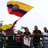 Supporters of Colombian left-wing presidential candidate Gustavo Petro celebrate after the presidential runoff election, in Cali, Colombia, on Sunday. | AFP-JIJI