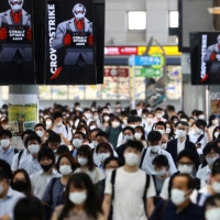 Shinagawa station in Tokyo in July 2021. The risk of flu infection is rising, because of reduced immunity in society stemming from a much lower number of influenza cases during the coronavirus pandemic. | REUTERS