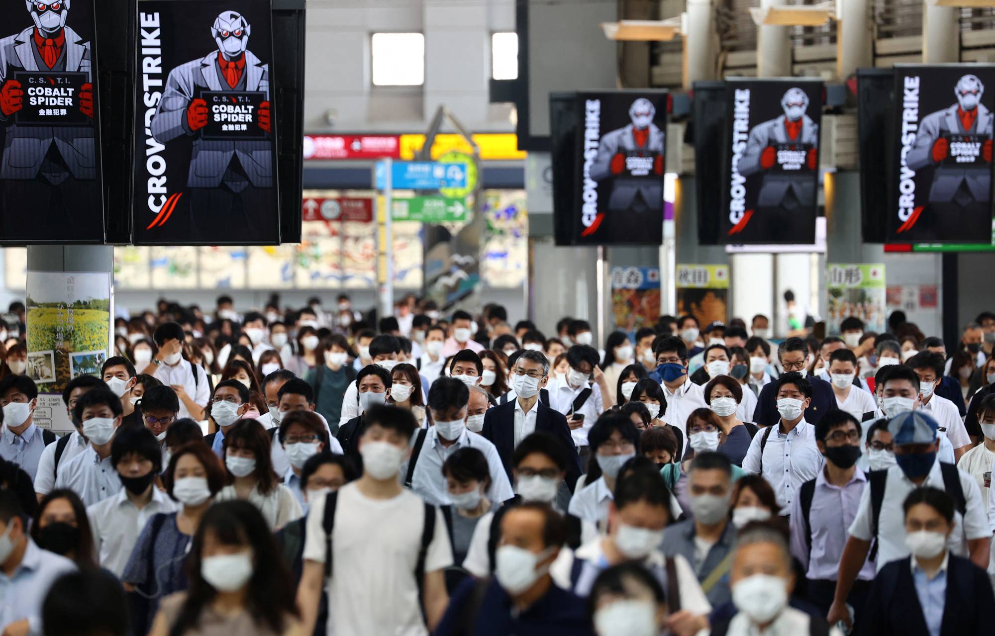 Shinagawa station in Tokyo in July 2021. The risk of flu infection is rising, because of reduced immunity in society stemming from a much lower number of influenza cases during the coronavirus pandemic. | REUTERS