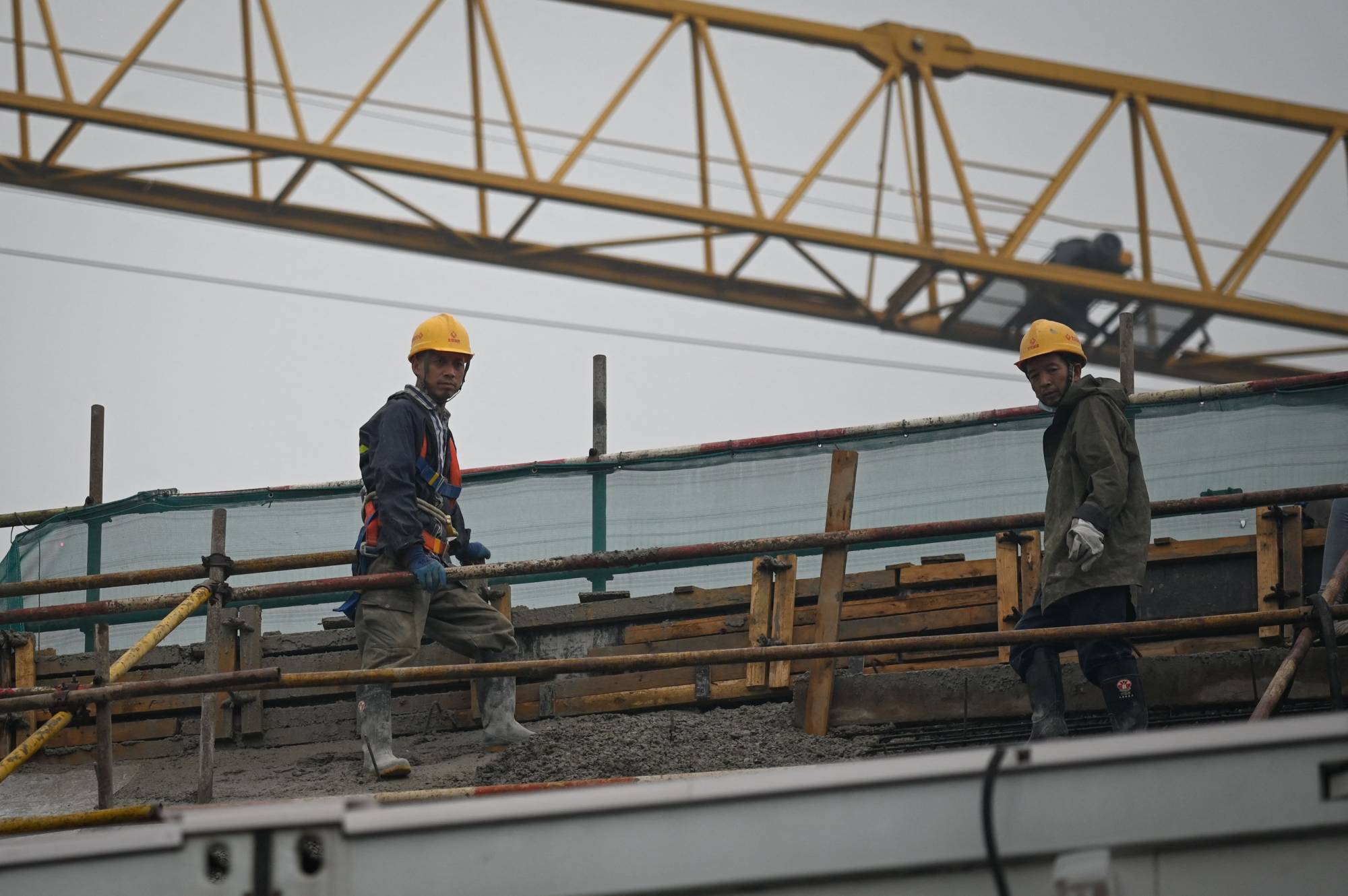 A construction site in Beijing on Wednesday | AFP-Jiji