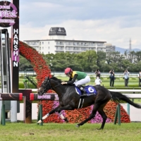 Titleholder wins the Takarazuka Kinen at Hanshin Racecourse in Takarazuka, Hyogo Prefecture, on Sunday. | KYODO