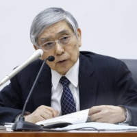 Bank of Japan Gov. Haruhiko Kuroda speaks during a news conference in Tokyo on June 17. | BLOOMBERG