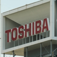 Toshiba shareholders endorsed two board directors from activist hedge fund investors at its annual general meeting on Tuesday. | AFP-JIJI