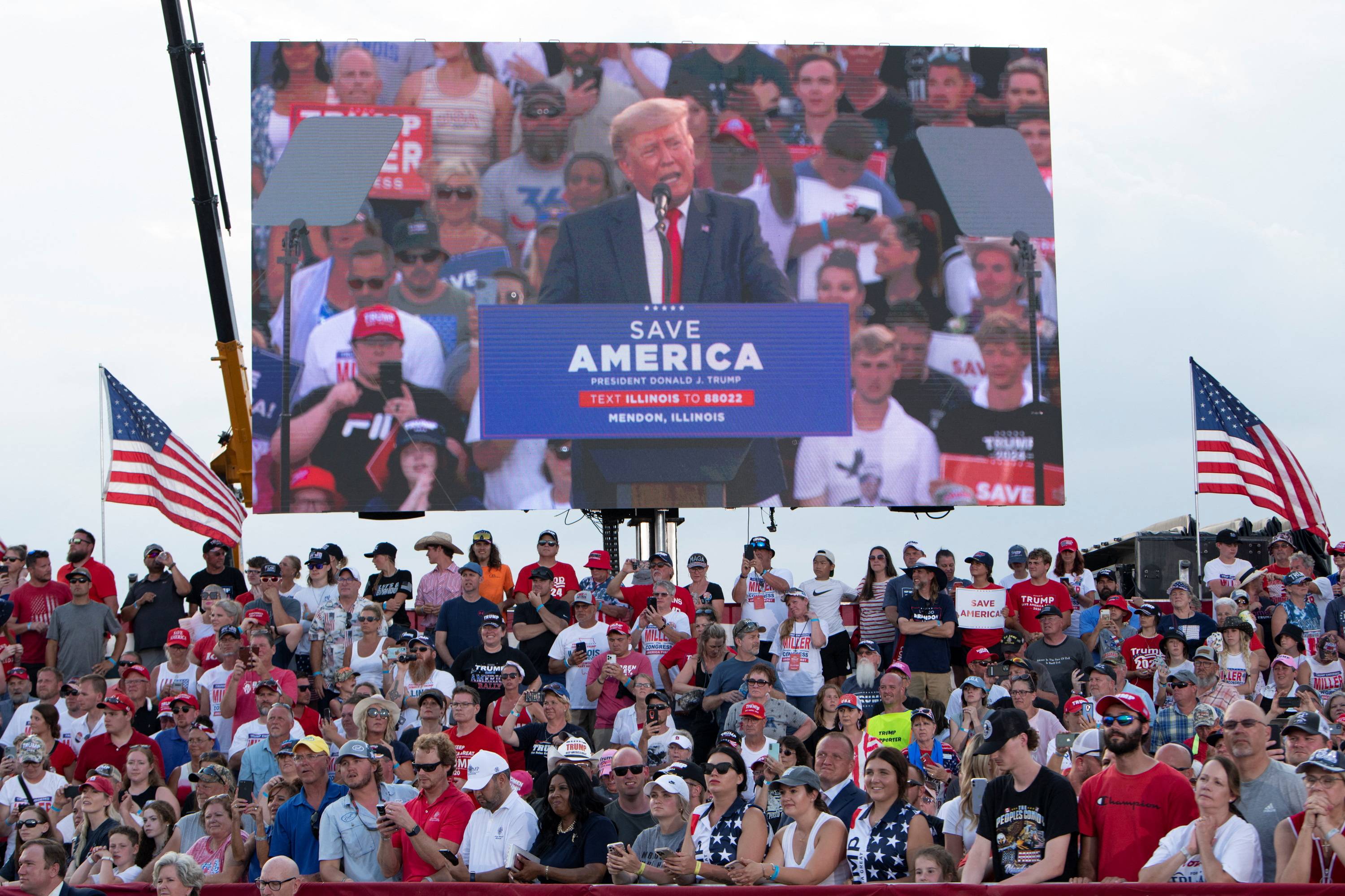 Former U.S. President Donald Trump holds a rally in Mendon, Illinois, on Saturday. | REUTERS