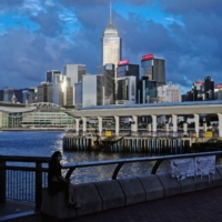 A billboard marking the 25th anniversary of Hong Kong\'s return to Chinese rule atop buildings in Hong Kong. The city\'s border with mainland China is effectively closed, but it doesn’t have the autonomy it once enjoyed to open to the world. | BLOOMBERG 