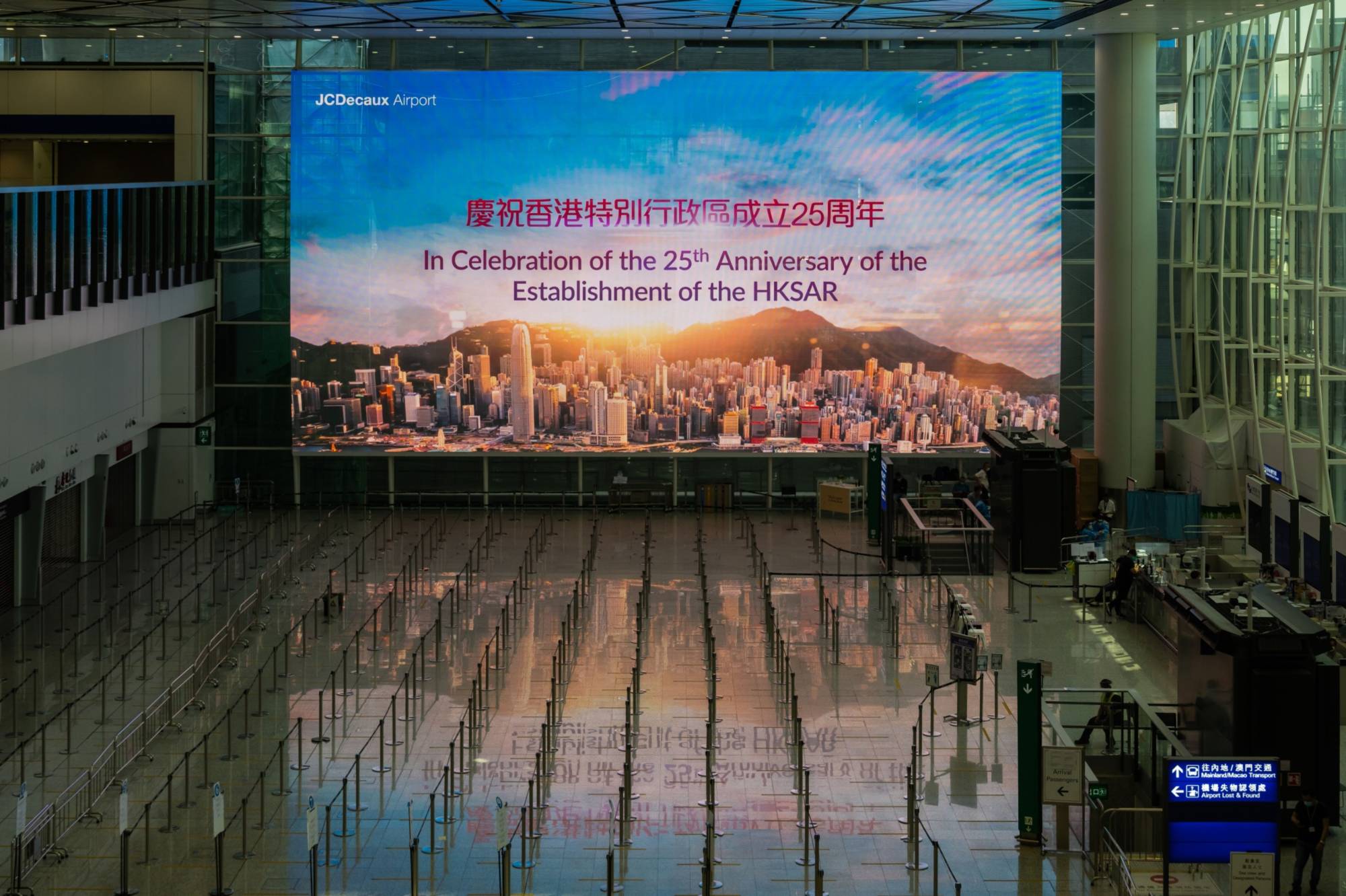 The arrival hall at Hong Kong International Airport on June 24. The city's future as a financial center is in doubt, as businesses shift workers to more accessible locations like Singapore. | Bloomberg 
