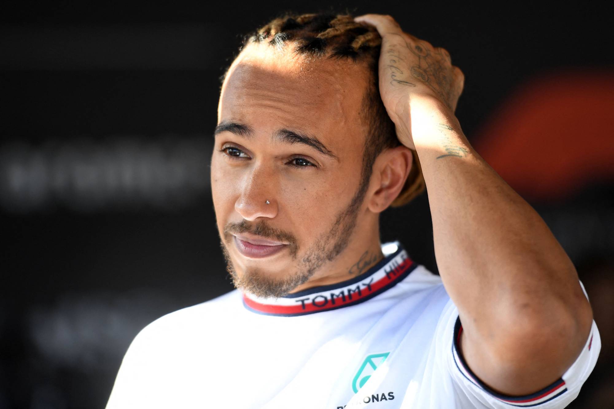 Mercedes driver Lewis Hamilton has called for 'action' after a racist comment toward him made by three-time Formula One champion Nelson Liquet resurfaced on social media. | AFP-JIJI