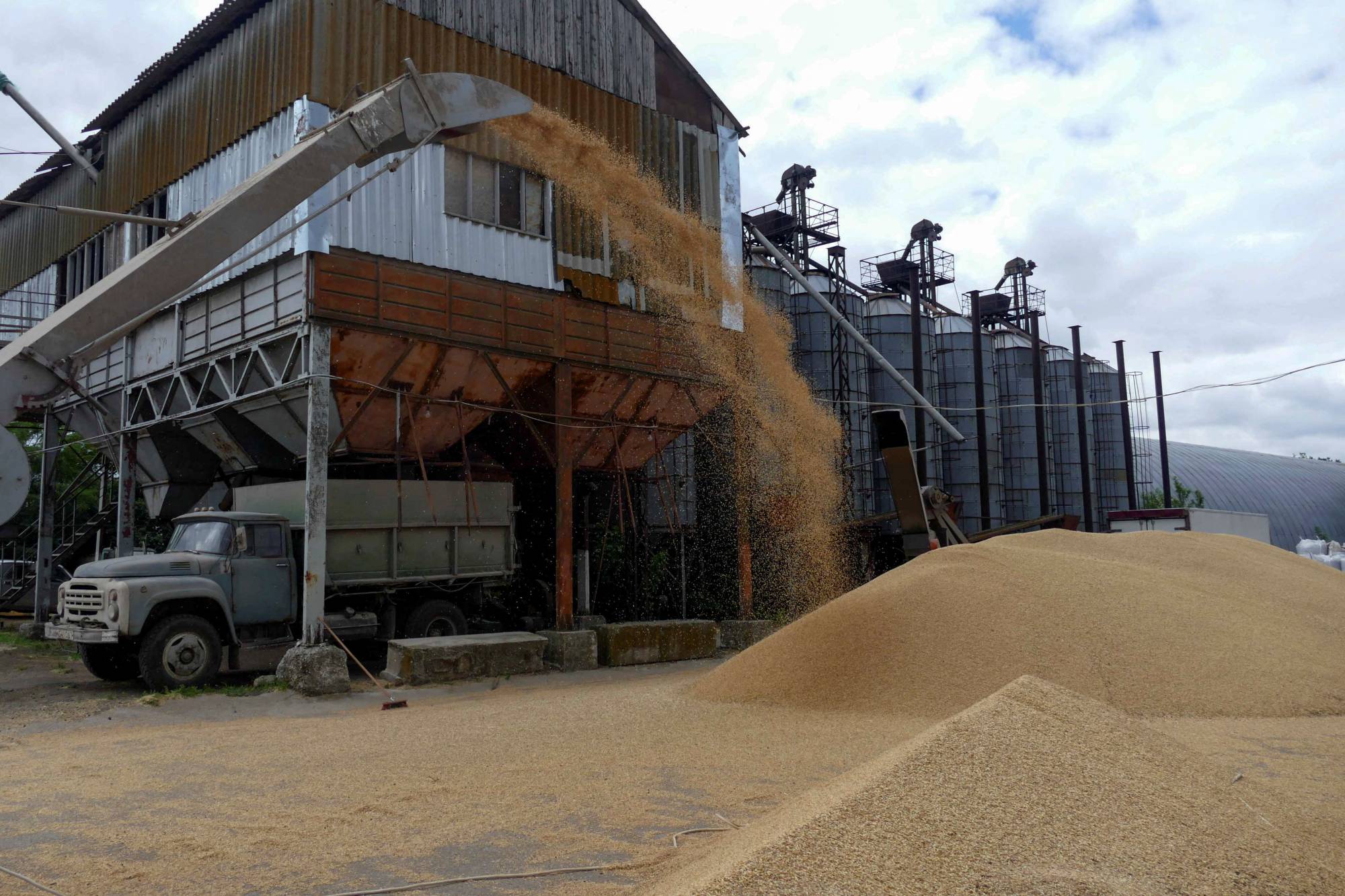 A truck at a grain terminal in Ukraine's Odesa region this month. Ukraine's grain output could take years to rebuild after fighting wrecked crop handling, storage and shipping infrastructure. | REUTERS