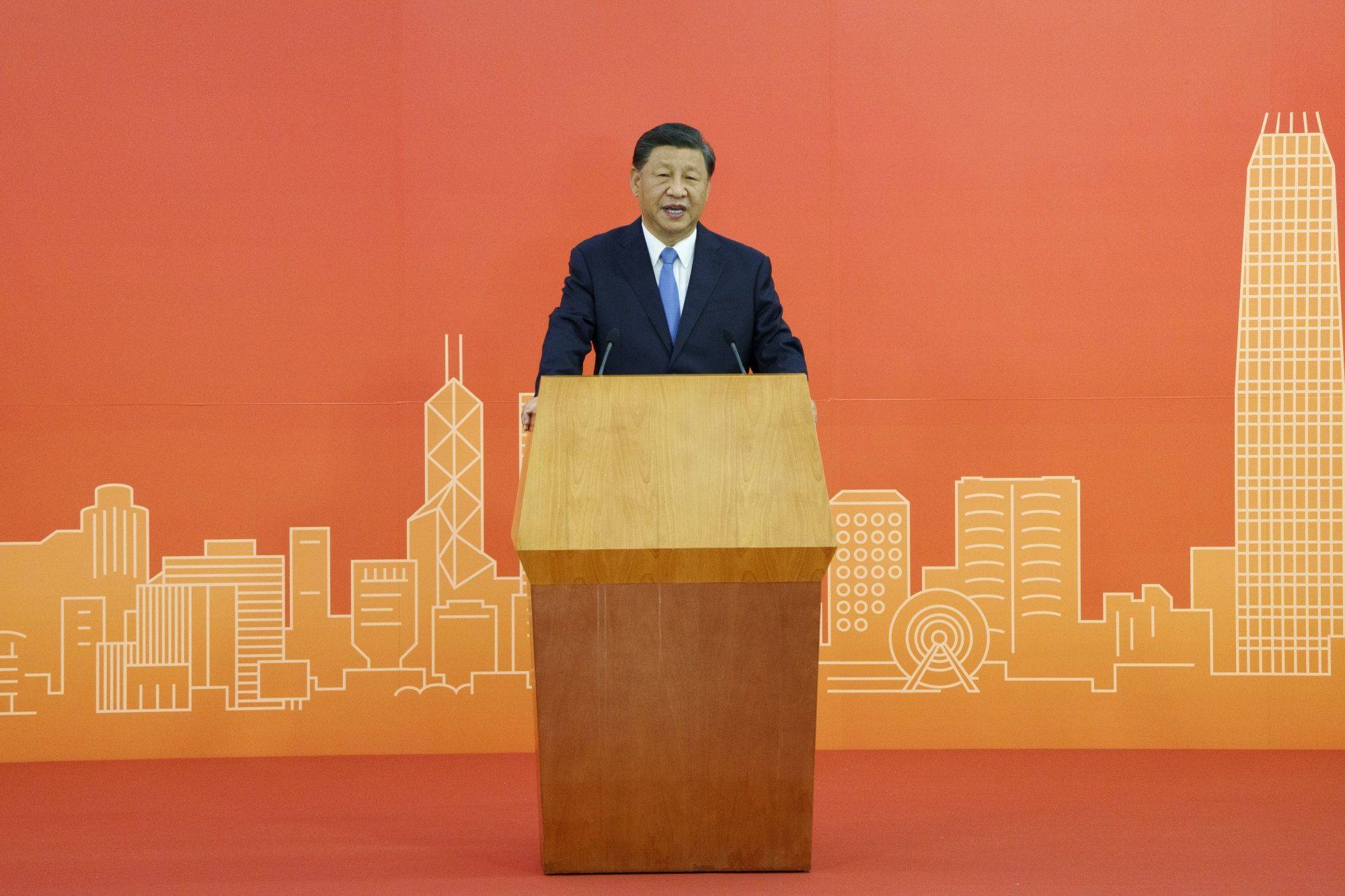 Chinese President Xi Jinping speaks at the West Kowloon Station in Hong Kong on Thursday. The Chinese leader said the city’s 'One Country, Two Systems” governance formula would ensure its prosperity and stability as the finance hub contributed to China’s 'great reunification.”  | BLOOMBERG