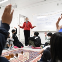 An instructor leads a workshop for prospective students at Harrow International School Appi Japan. | BLOOMBERG
