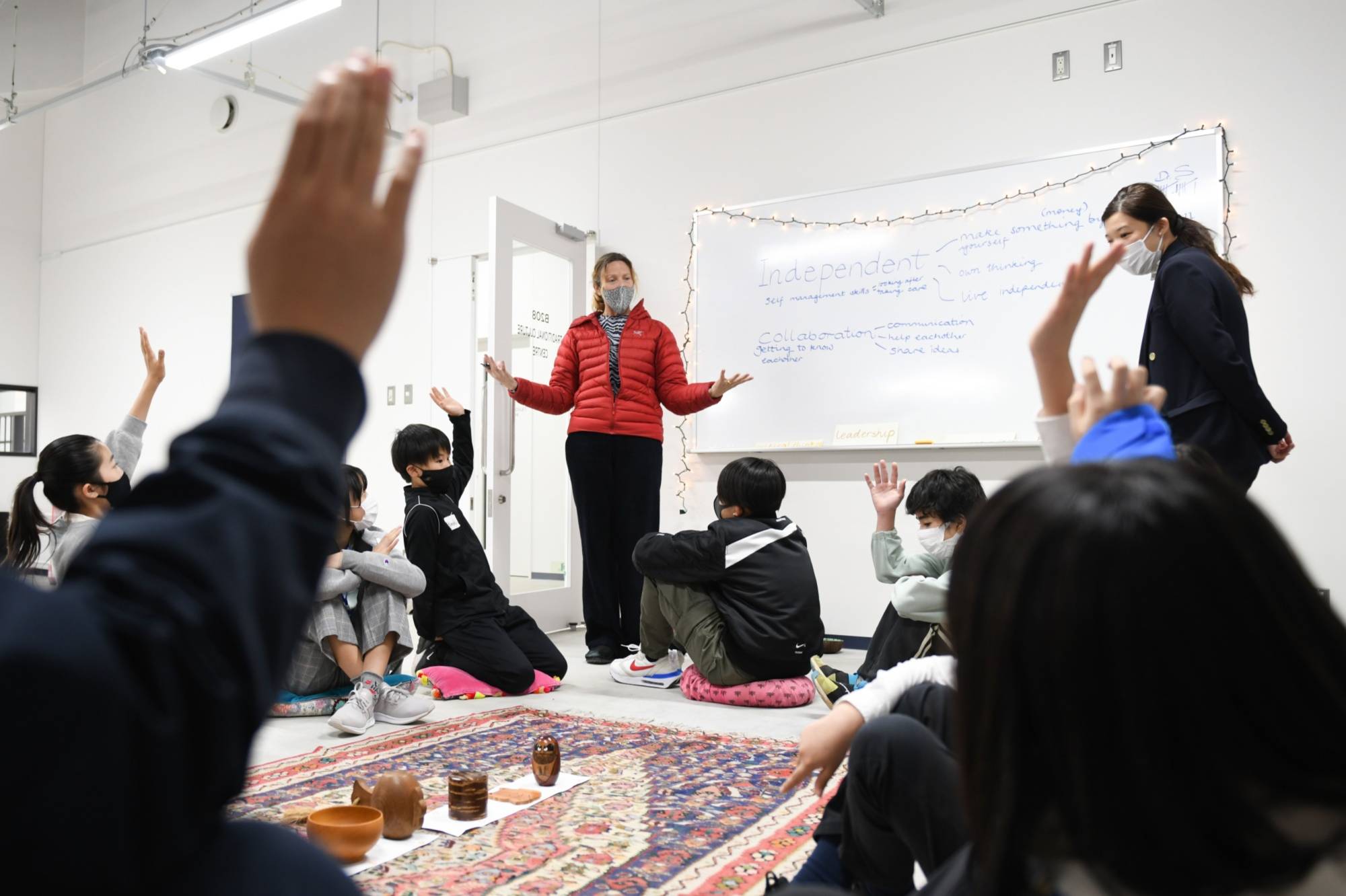 An instructor leads a workshop for prospective students at Harrow International School Appi Japan. | Bloomberg 