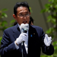 Prime Minister Fumio Kishida, who is also the ruling Liberal Democratic Party leader, delivers a speech during an election campaign tour for the July 10 Upper House election, in Kawasaki on June 24. | REUTERS