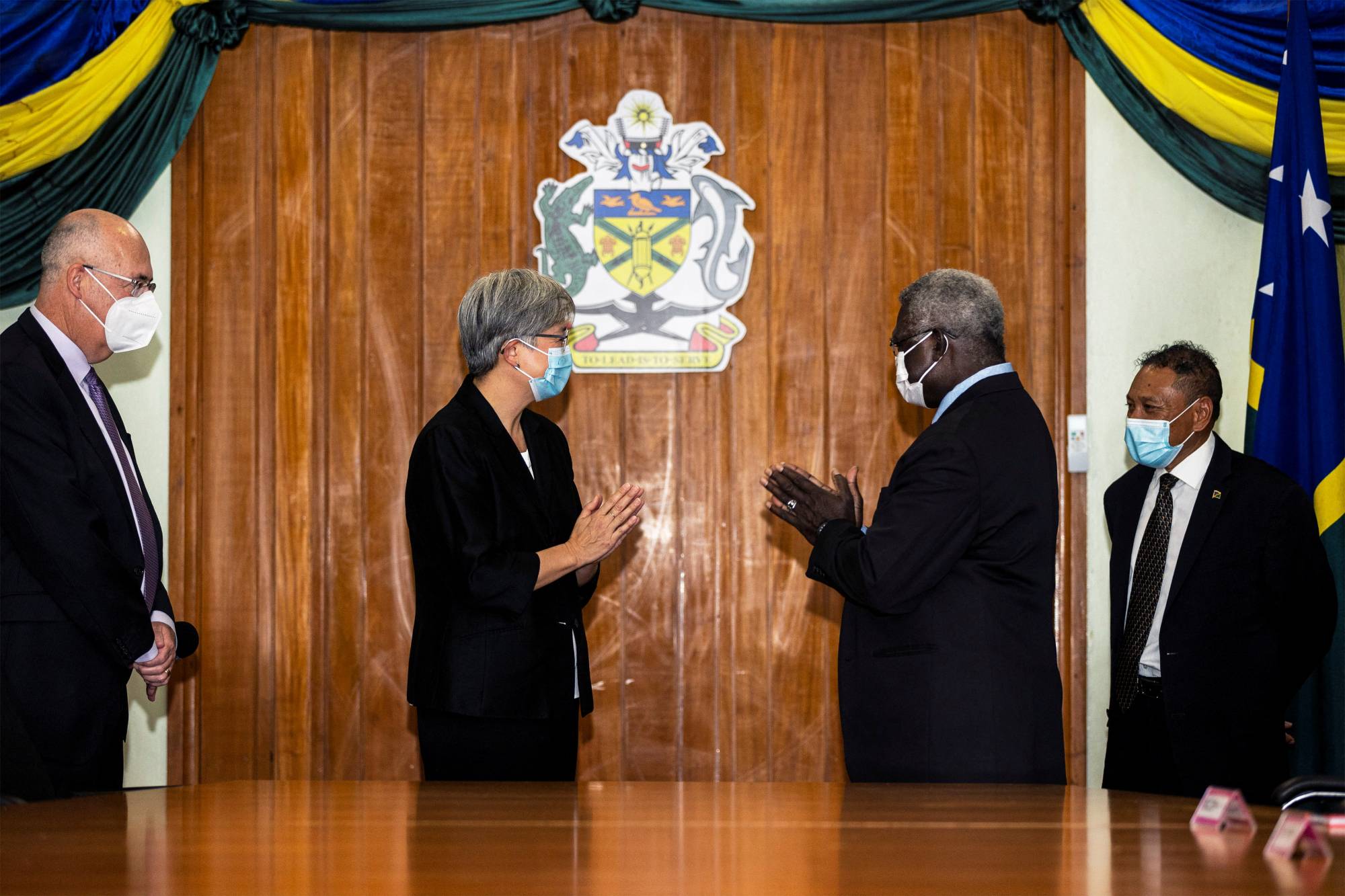 Australian Foreign Minister Penny Wong meets Solomon Islands Prime Minister Manasseh Sogavare in Honiara, Solomon Islands, on June 17. | AUSTRALIA DEPARTMENT OF FOREIGN AFFAIRS AND TRADE / VIA REUTERS