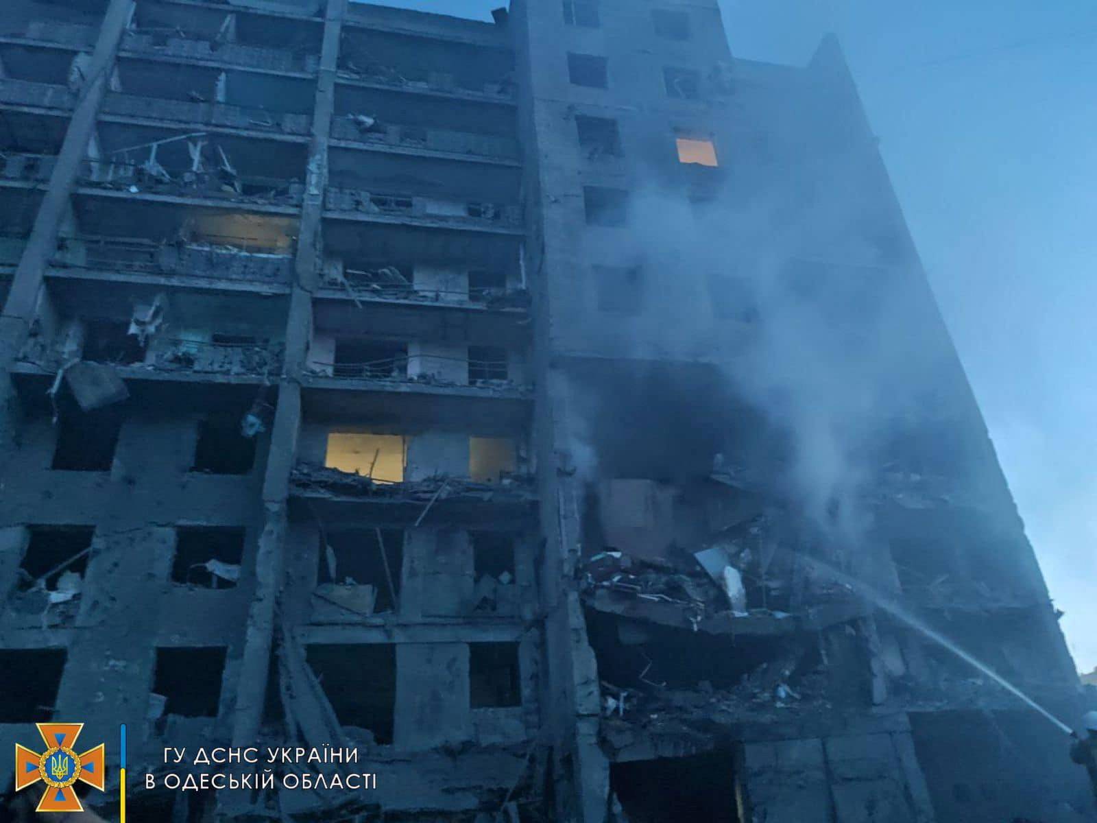 Rescue workers work at the scene of a missile strike at a location given as Bilhorod-Dnistrovskyi, Odesa region, Ukraine, on Friday. | STATE EMERGENCY SERVICES OF UKRAINE / VIA REUTERS