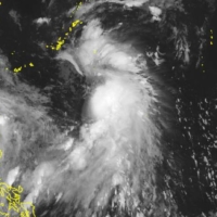 A satellite image shows Tropical Storm Chaba (left), which is approaching China, and Tropical Storm Aere, which is nearing Okinawa, on Friday evening.  | JAPAN METEOROLOGICAL AGENCY