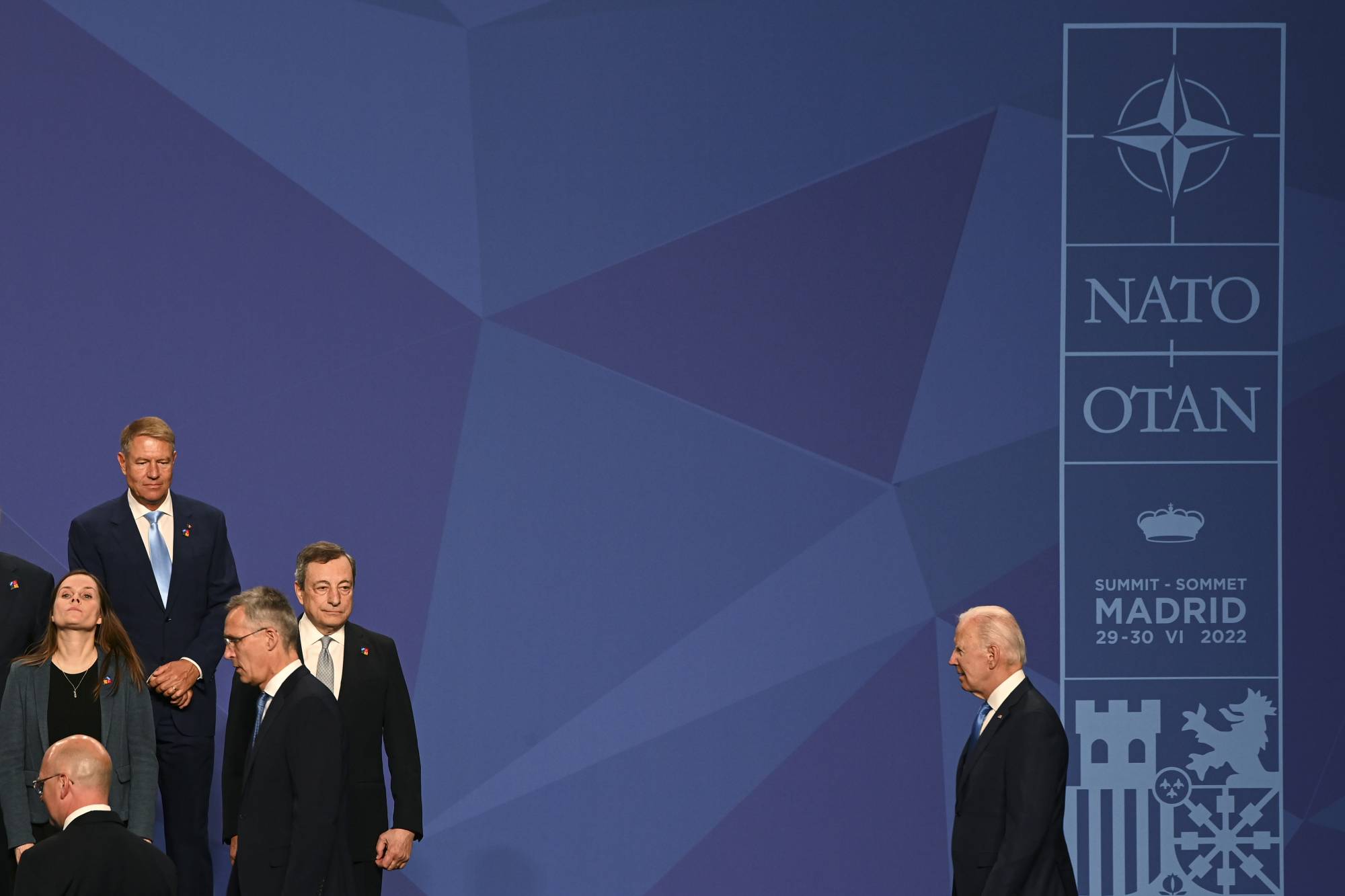 U.S. President Joe Biden joins other NATO leaders for a group photo at the bloc's summit in Madrid on Wednesday. The alliance’s forceful declaration that China was a systemic 'challenge' in its mission statement reinforced Beijing’s belief that hostile powers are bent on hobbling the country’s ascent.  | KENNY HOLSTON / THE NEW YORK TIMES