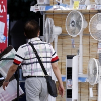 Fans are displayed at an electronics store in Tokyo\'s Yurakucho district on Friday. | BLOOMBERG