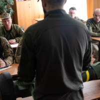 An American volunteer teaches Ukrainian soldiers how to use a Javelin anti-tank missile at a base outside of Zaporizhzhia, Ukraine, on April 28. Special Operations veterans are training Ukrainians near the front lines in the fight against Russia, despite warnings from the Pentagon. | LYNSEY ADDARIO / THE NEW YORK TIMES