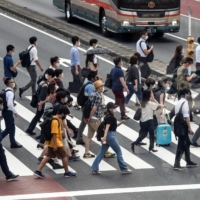 Japan\'s inflation-adjusted real wages fell 1.8% in May from a year before, declining the most since the early months of the pandemic. | BLOOMBERG