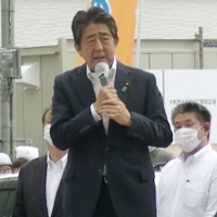 Abe makes a stump speech in Nara on Friday. He was shot immediately after this picture was taken. | KYODO