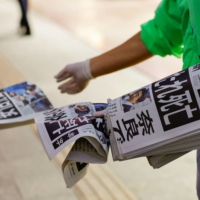 A special edition of the Yomiuri Shimbun newspaper reporting Abe\'s death is distributed in Tokyo. | REUTERS