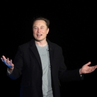 Elon Musk gestures speaks during a news conference at SpaceX\'s Starbase facility near Boca Chica Village in South Texas in February. | AFP-JIJI