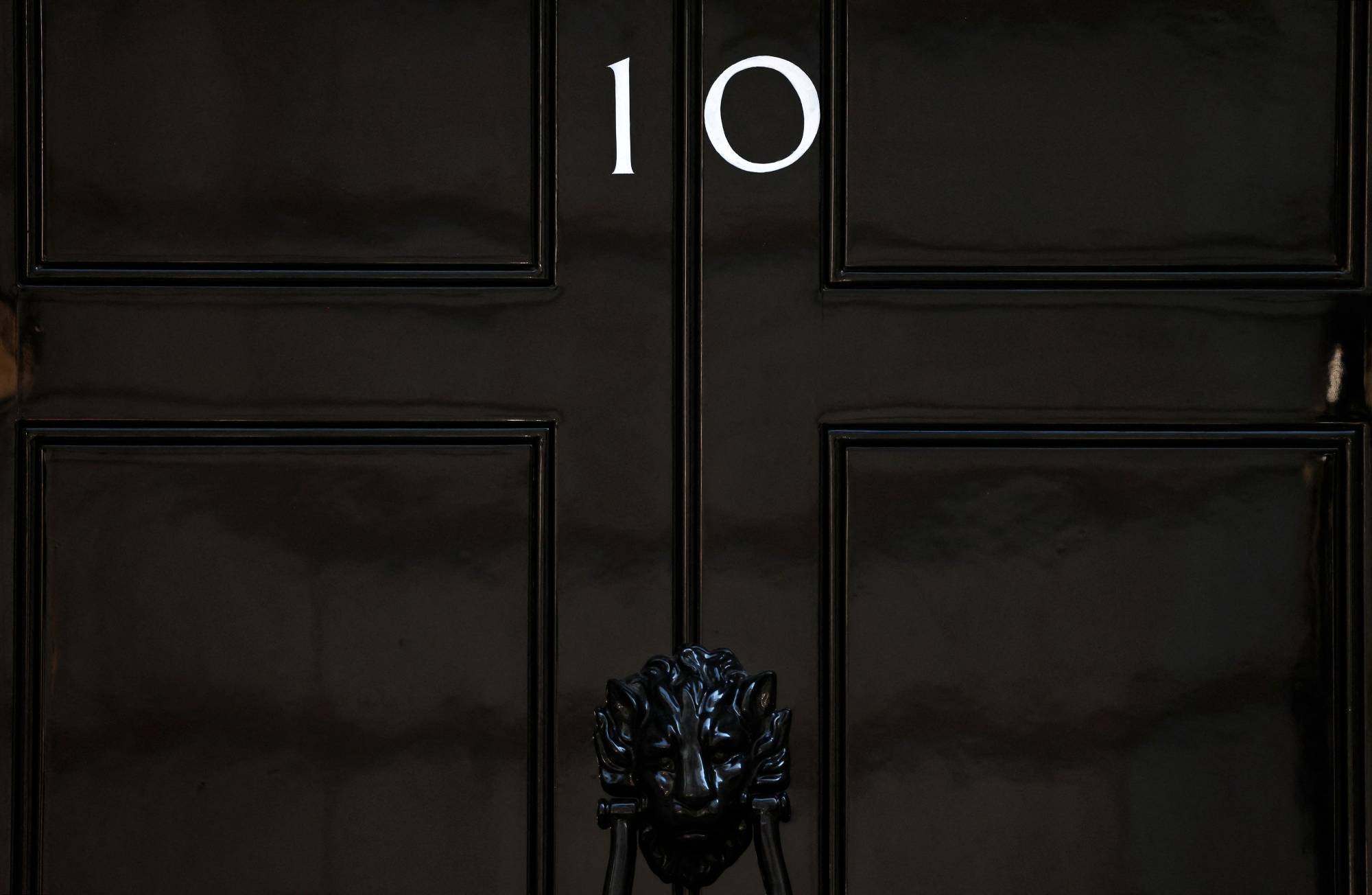 The door of No. 10 Downing St., the official residence of Britain's Prime Minister, is pictured in central London on Friday. | AFP-JIJI