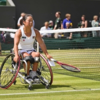Yui Kamiji reacts after her Wimbledon women\'s wheelchair final defeat to Diede de Groot in London on Saturday. | KYODO