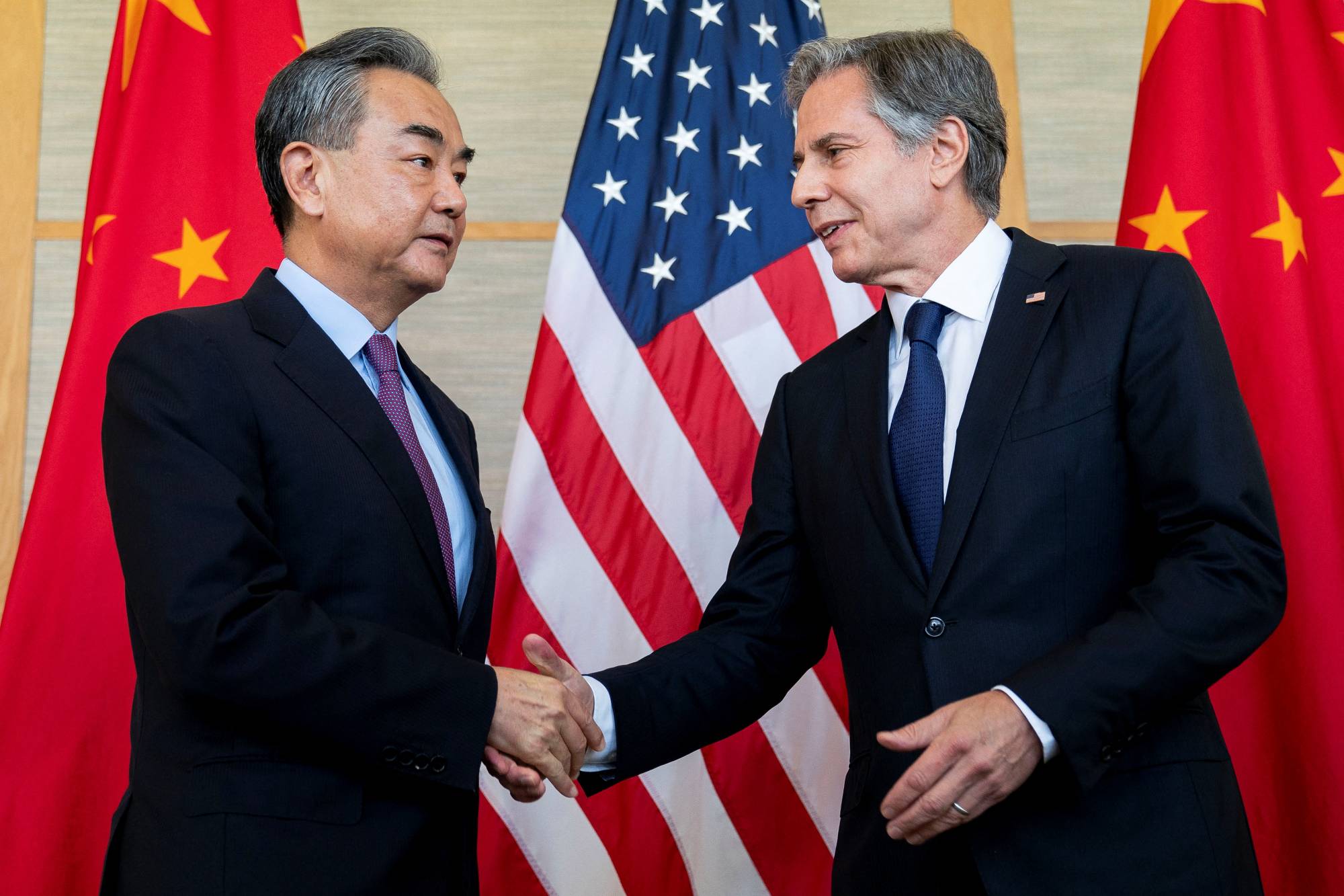 U.S. Secretary of State Antony Blinken meets Chinese Foreign Minister Wang Yi during a meeting in Nusa Dua, Bali, Indonesia, on Saturday. | POOL / VIA REUTERS