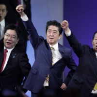 The death of Shinzo Abe, namesake of Japan\'s Abenomics policy, could eventually allow Prime Minister Fumio Kishida to phase out Abe\'s government spending and monetary stimulus. | BLOOMBERG