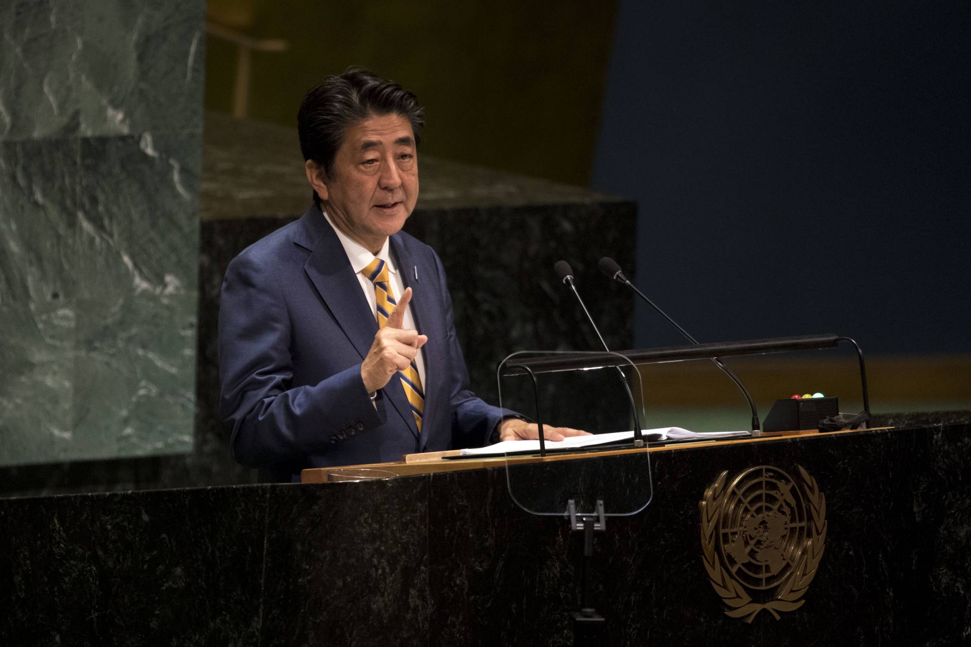Then-Prime Minister Shinzo Abe addresses the United Nations General Assembly in New York on Sept. 24, 2019. | DAVE SANDERS / THE NEW YORK TIMES
